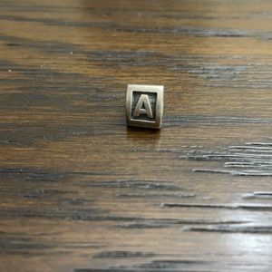 Beautiful retired letter charm